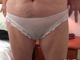 granny with big tits wears pantyhose as she fucks a dildo